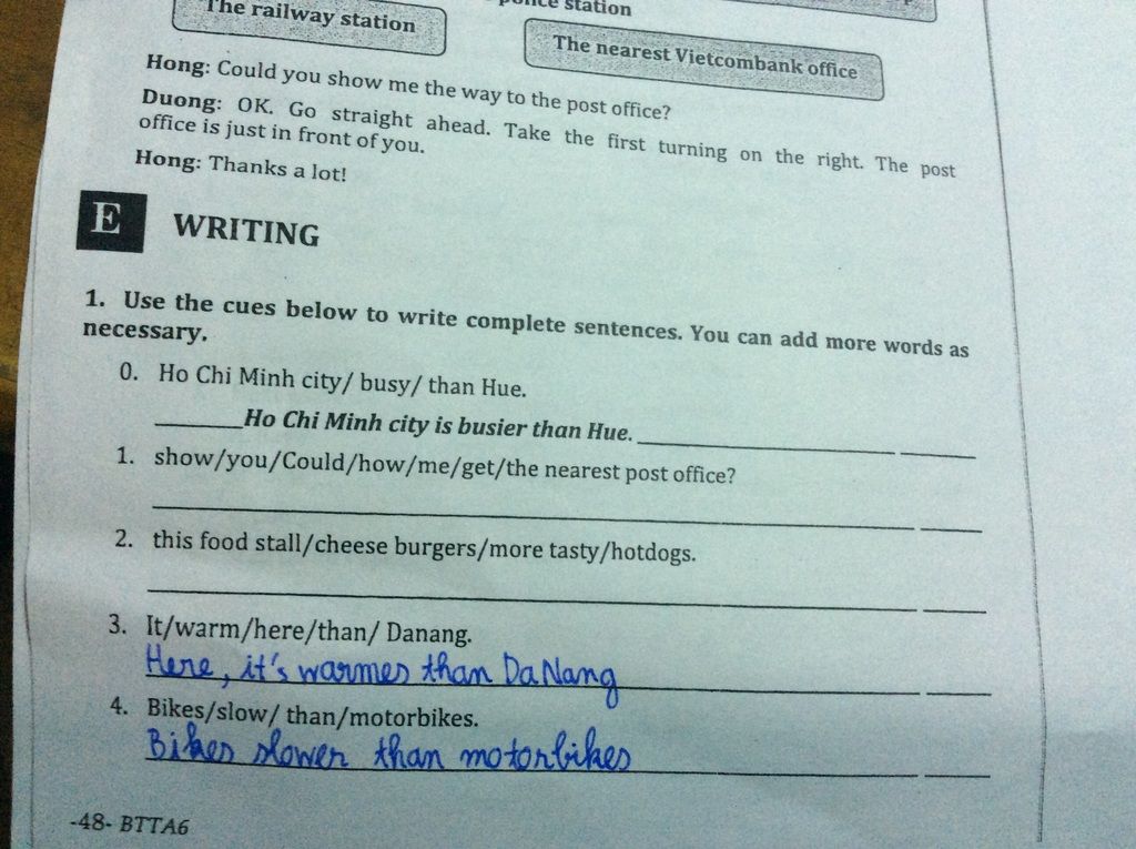 tion The railway station The nearest Vietcombank office Hong: Could you  show me the way to the post office? Duong: OK. Go straight ahead. Take the  first tu